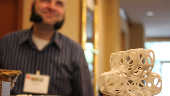 A 3D printed sculpture sits on a table